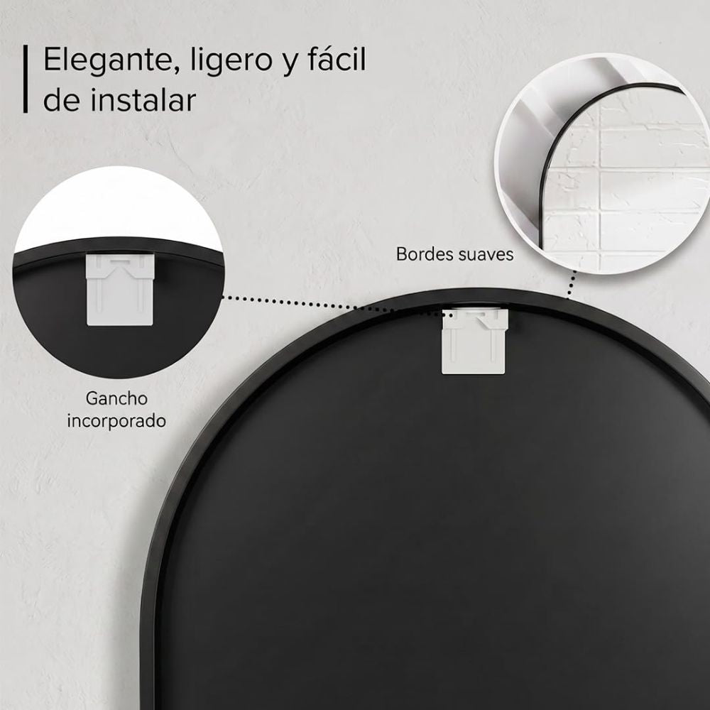 Espejo ovalado con cristal HD instalado sobre un lavabo doble en un baño moderno.