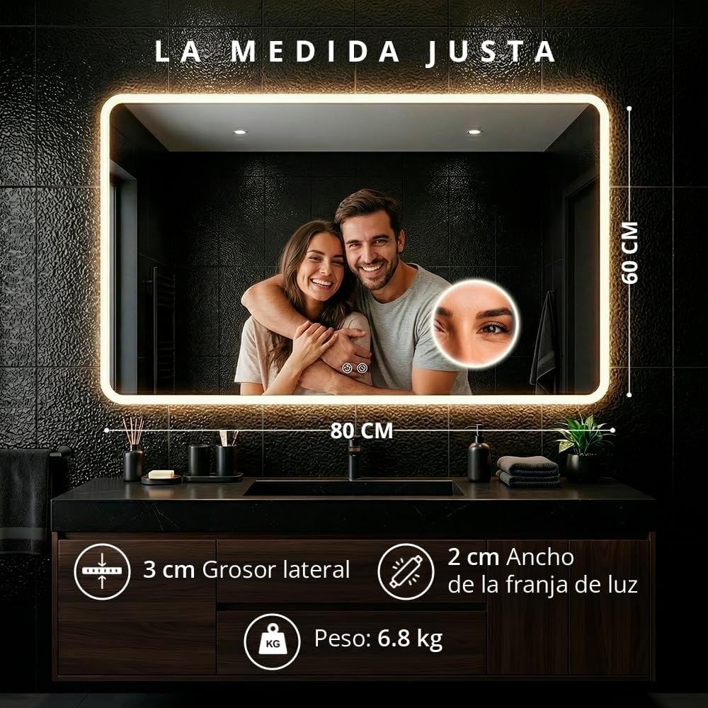 Espejo LED antivaho de 80x60 cm instalado sobre un mueble de doble lavabo en un baño moderno.