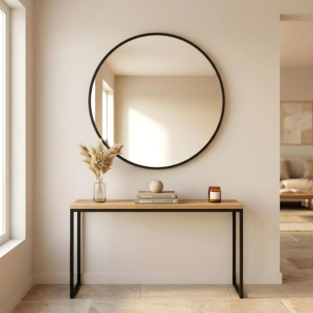 Salón minimalista con espejo redondo de pared negro gigante de 120x120 cm.